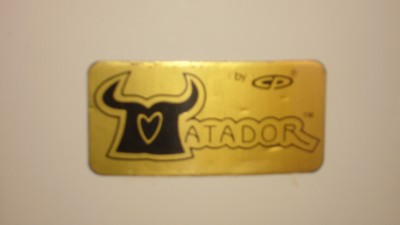 Matador badge on 1988 Fiberglass conga.JPG